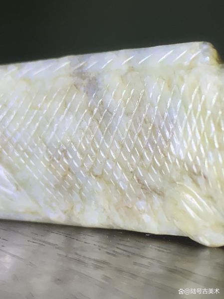 辽代双鱼玉佩价格_辽代双鱼玉佩真伪如何鉴别