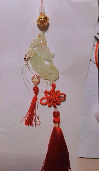 彭双鱼玉佩是什么_彭双鱼玉佩值钱吗