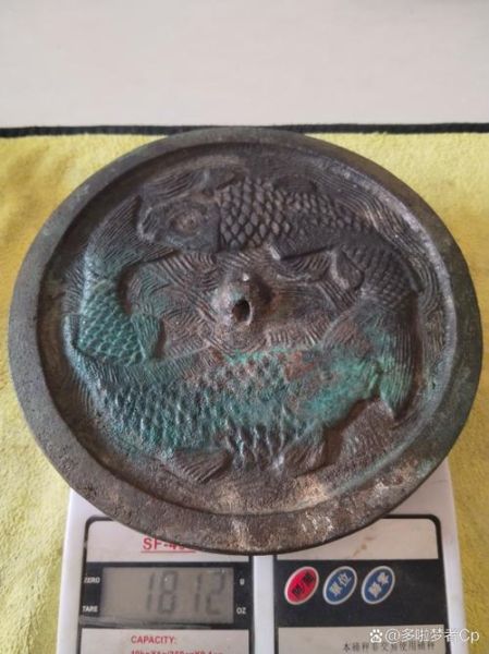 辽金双鱼铜镜价格_辽金双鱼铜镜怎么鉴定