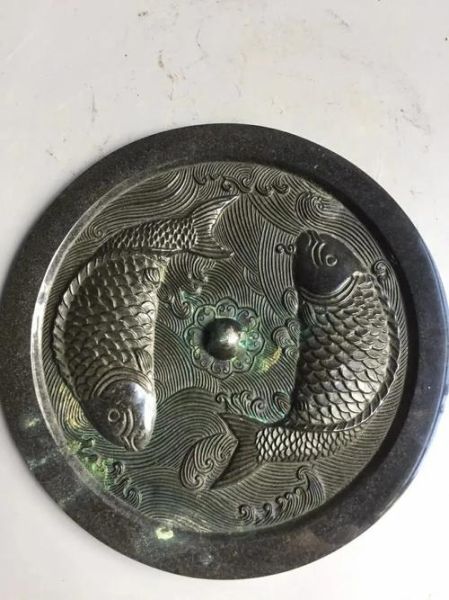 青铜镜双鱼寓意_如何鉴别真伪